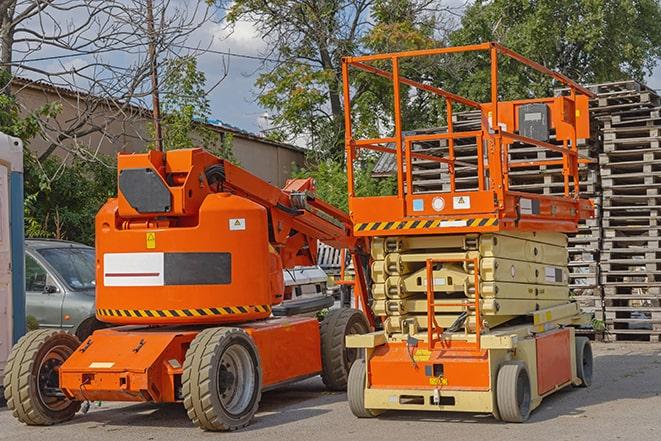 daytime activity in a bustling warehouse with forklift in Franksville